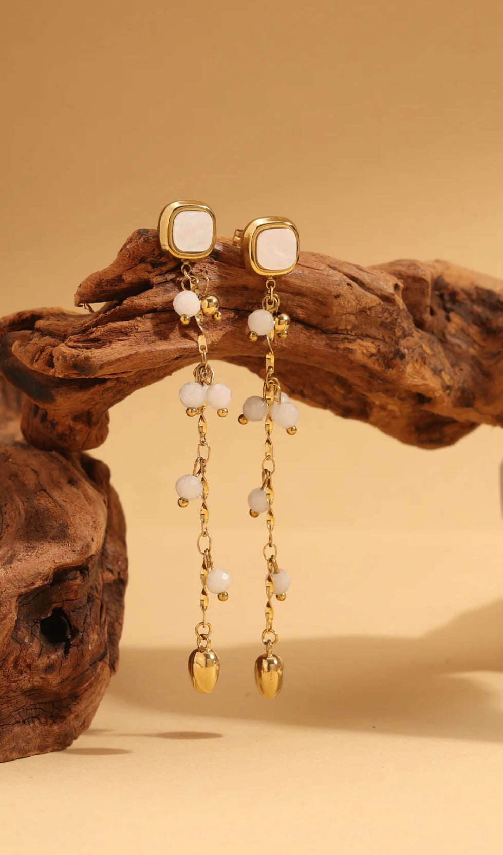 Boucle d’oreille longue rose