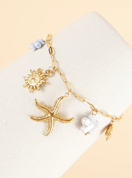 Bracelet coquillage touche de bleu