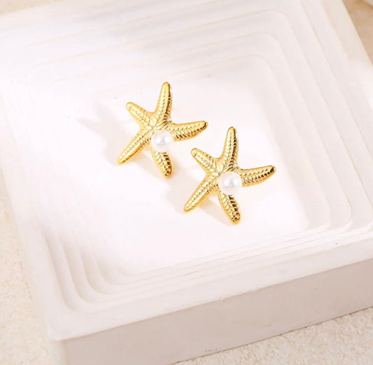 Boucle d’oreille étoile de mer perle blanche