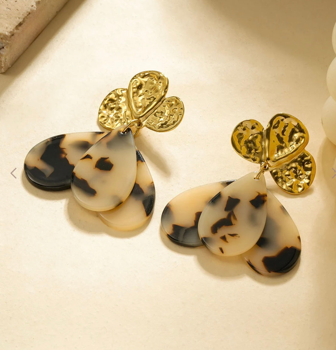 Boucle d’oreille pétales léopard